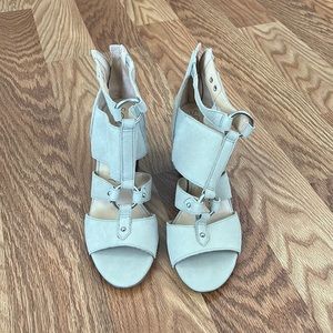 New cream color leather 3.5 heels. Zipper back. Never been worn. Size 9